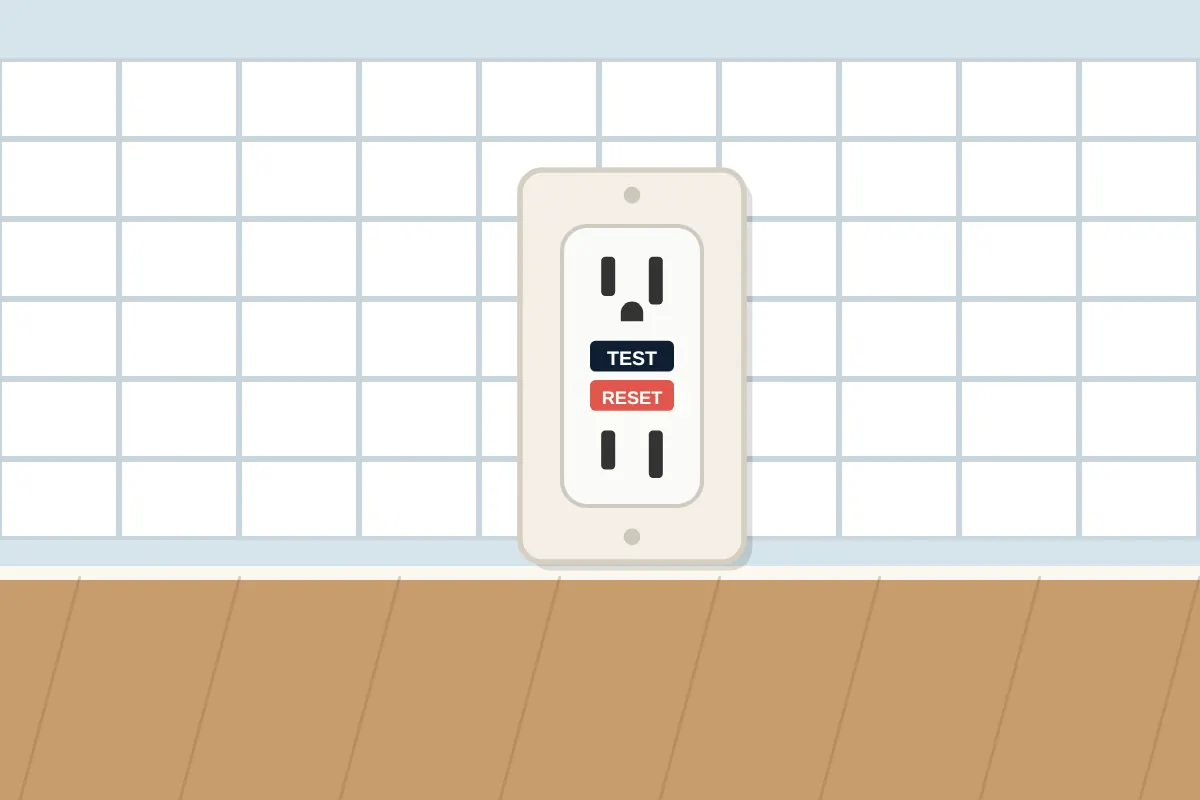 GFCI outlet with test and reset buttons on a white tiled kitchen wall