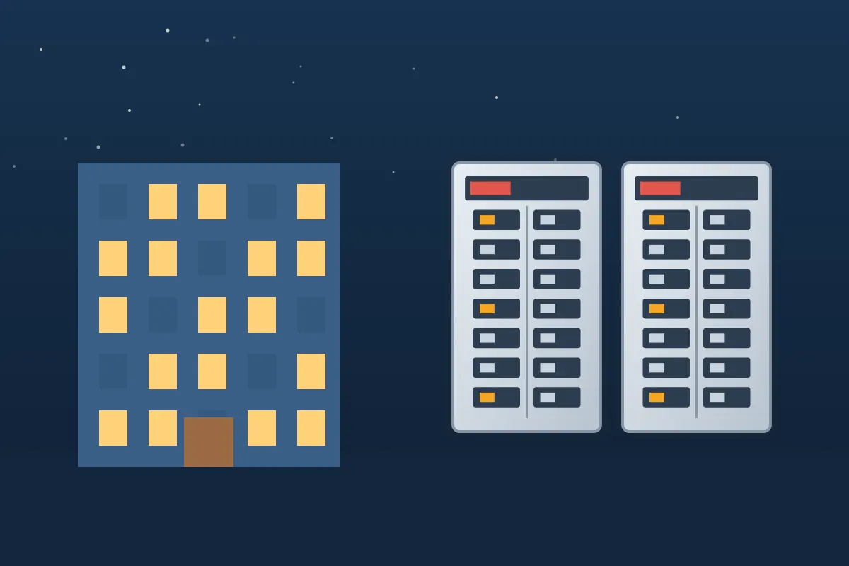 Apartment building with lit windows beside two electrical panels